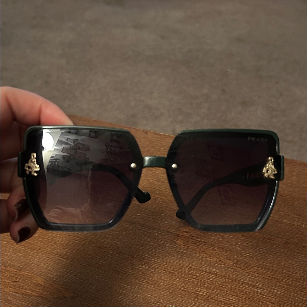 Prada Black Sunglasses with Gold Accents